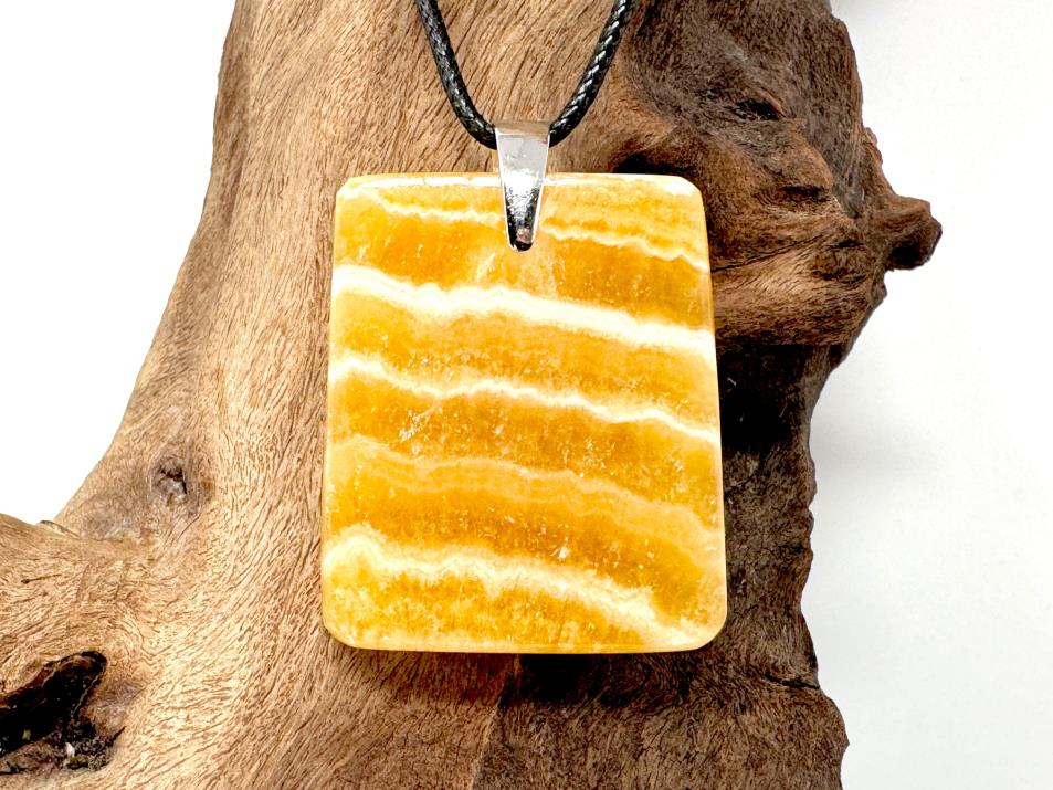 Banded Orange Calcite Pendants For Sale