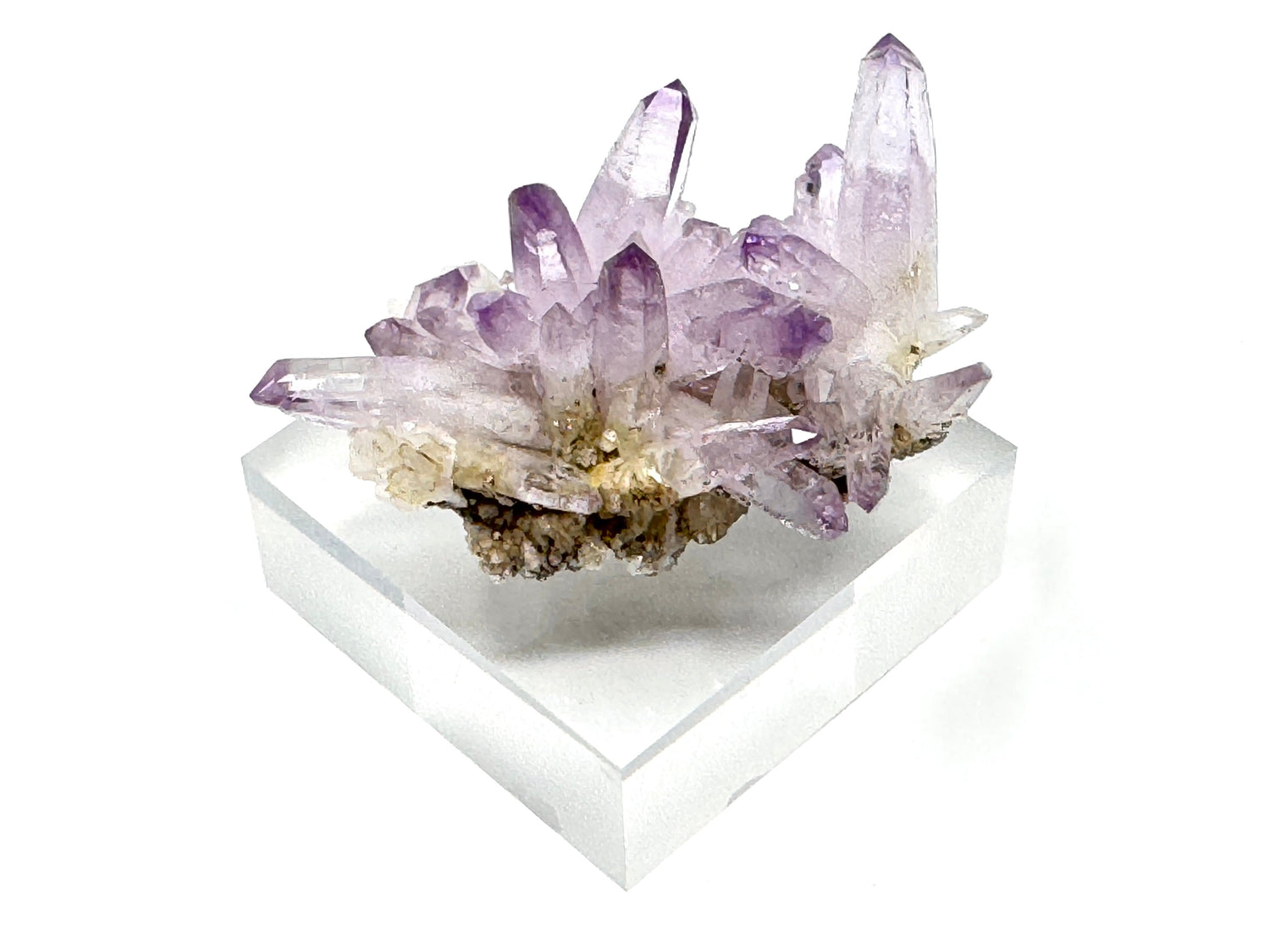 Raw Vera Cruz Amethyst Cluster on matrix showing a cluster of purple Amethyst crystals as Vera Cruz Amethyst points