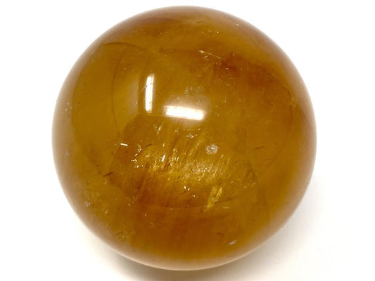 Polished Optical Honey Calcite Crystal Sphere 5.9cm